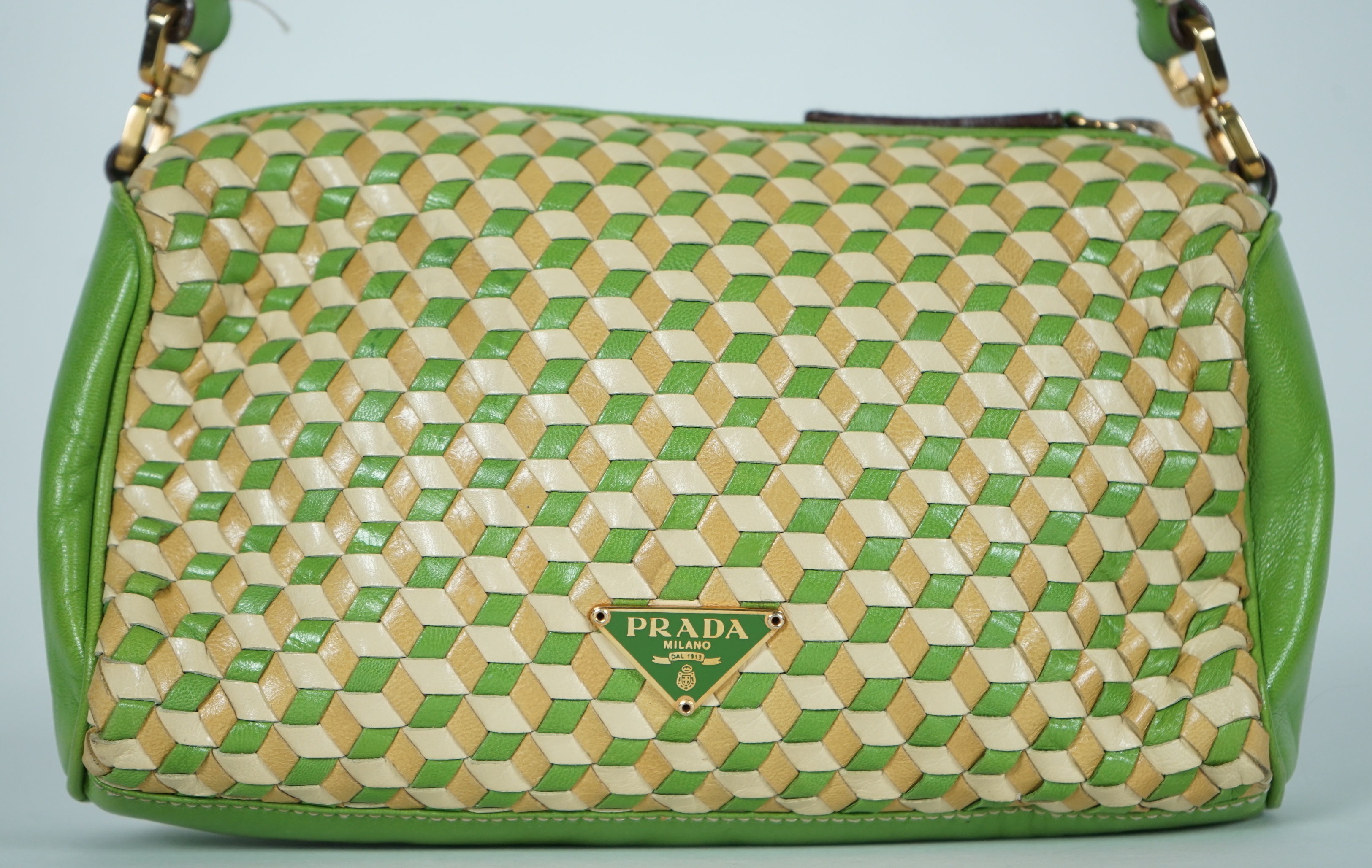 A Prada green and beige leather Intreccio Cube shoulder bag, width 20cm, height 13cm, depth 5.5cm